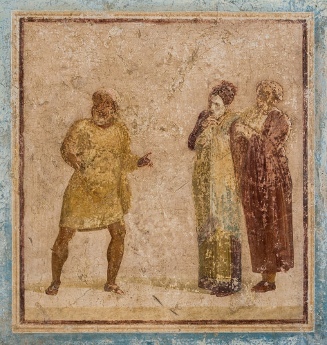 In this fresco: an actor in a mask gestures broadly with a wide-legged stance while two other actors look on intently.