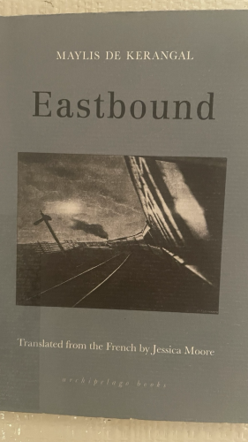 Book cover featuring warped photo of train and tracks 