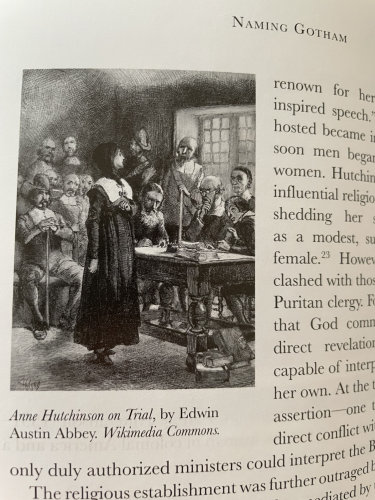 photo of a page from Naming Gotham.  On the left is an ink drawing of Anne Hutchinson standing facing her accusers and clearly spouting scripture at them as they ponder her fate (Image by Edwin Austin Abbey).  There are also bits of the text from the book visible explaining how Anne Hutchinson defied Puritan theology