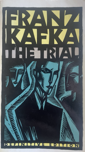 Book cover featuring a woodcut of an unhappy looking man 