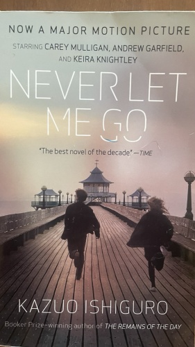 Book cover featuring three people running down a pier 