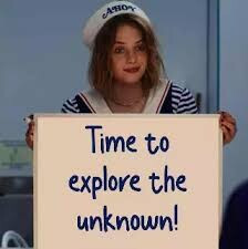 Women in a sailor outfit holds a sign: Time to explore the unknown!