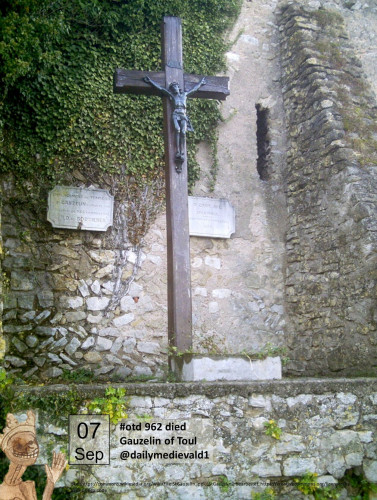 The picture shows a wooden cross