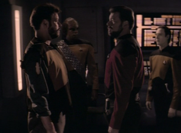 Tom & Will Riker look at each other with Data & Worf in the background

2 Rikers?! Hmm...