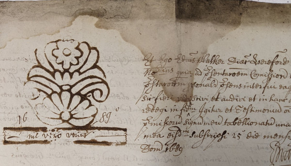 Manuscript in iron gall ink with hand drawn notary mark in shape of flowers and leaves