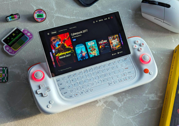 A photo showing a Windows gaming handheld with a floating, sliding screen that reveals a keyboard underneath.