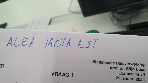 The top part of an exam sheet for the course statistics. A student wrote in large letters "Alea iacta est" at the top of the paper.