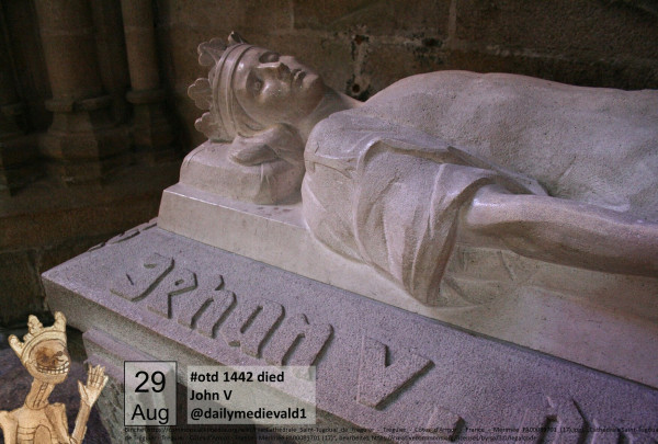 The picture shows a tomb with reclining figure made of white stone