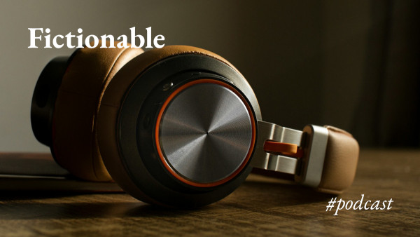 A pair of headphones with the text 'Fictionable #podcast'