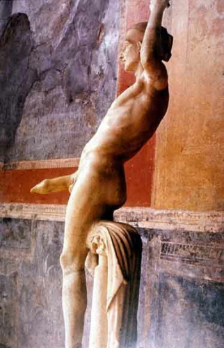 A statue of Priapus with a large erect phallus in a villa.
