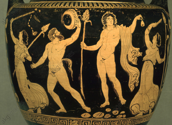 Dionysos is holding his thyrsos in his right and is ringing a bell with his left. He is standing fully nude with a long piece of cloth slung over his left shoulder.
Beside him, a satyr and two maenads dance, one of them has her breasts exposed and she is holding a dagger and a thyrsos. The other also holds a thyrsos and something that looks like a stick with a chain or string hanging from the tip.