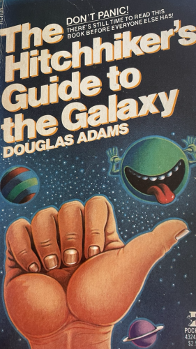 Book cover featuring a hand with thumb out and the bold words DON’T PANIC