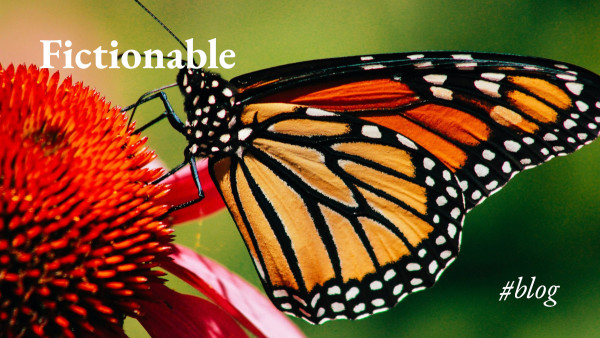 A monarch butterfly perched on a flower, with the legend 'Fictionable #blog'