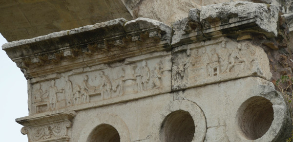 This is one side of the monument with a focus on the frieze with flour being ground, bread made, and the apparent selling of bread.