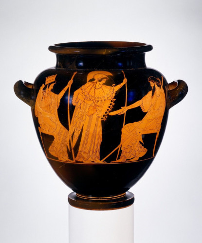 Red-figure vase painting of Athena wearing a crested helmet and her iconic aegis, stands between her step-mother Hera and her father Zeus, both of which are seated and holding a sceptre as well as a libation bowl. Athena holds a jug and Zeus is holding out his bowl towards her.