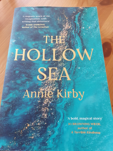 Blueish cover of The Hollow Sea by Annie Kirbie