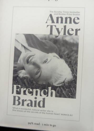 Cover of the e-book.Features the head of a smiling blond woman lying on grass.