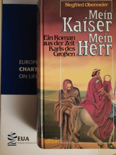 Cover von Siegfried Obermeier: Mein Kaiser Mein Herr - Ein Roman aus der Zeit Karls des Grossen. Zeigt einen König zu Pferd und einen Gelehrten dahinter.