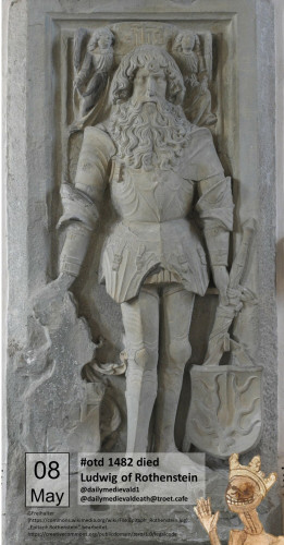 The epitaph shows a man with long hair and beard in armor.