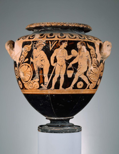 Hermes, Polydeukes, and a satyr old and fat enough to be called Silenos are shown in a scene possibly inspired by a satyr play. Hermes stands at the left, his right leg propped on the tendril of an adjacent palmette. He wears high-laced sandals and a winged helmet and carries his caduceus in his left hand. He looks back to the right at Polydeukes, who stands looking at the egg in his left hand that contains his sister Helen. In his other hand is a mattock, with which he will crack open the egg. Approaching from the right is Silenos, wearing shoes and carrying a situla in his right hand and a phiale in his left.