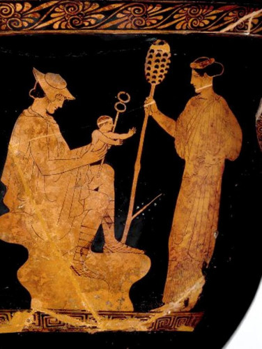 Red-figure vase painting of Hermes, seated, wearing his signature chlamys cloak and traveller's hat, holds in his hands both his kerykeion staff and his baby brother Dionysos. The infant demigod reaches for the nymph of Nysa holding a thyrsos or maybe just for the thyrsos, a staff with a pine cone on top, which would become iconic for him and his retinue.