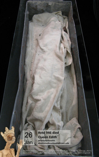 The picture shows a stone tomb slab with a semi-plastic female figure. She is wrapped in precious robes and crowned.