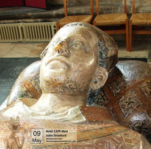 The picture shows the torso and head of a painted effigy