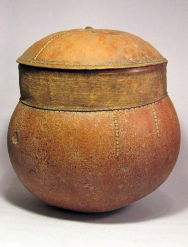 A huge Calabash container with fitted lid, made by the Tuareg nomads of the Sahara Desert in West Africa.