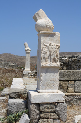 Marble plinths topped with giant but broken phalloi. The balls form the base of the sculptures but the shaft and head of each phallus is missing.