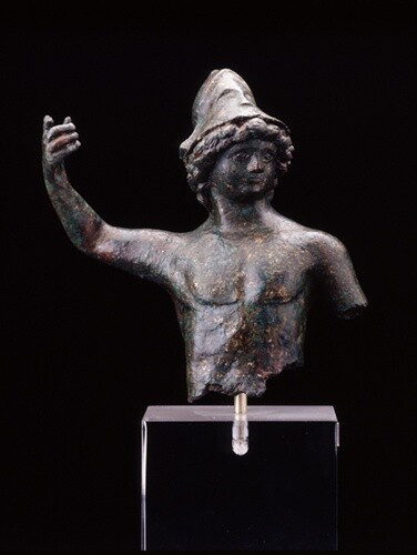 Bronze sculpture of the god Mars. His lower body and left arm is missing. His right arm is raised and probably used to hold a spear. He wears a helmet on a head of curly hair.