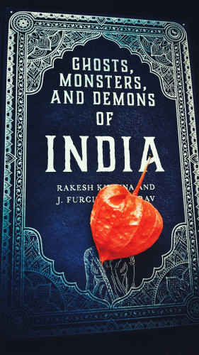 Book cover. Ghosts, Monsters and Demons of India with a Chinese Lantern flower