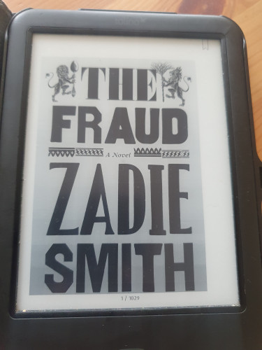 Book cover on an eBook reader of The Fraud by Zadie Smith