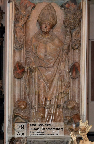 The detailed tomb shows the bishop in full regalia