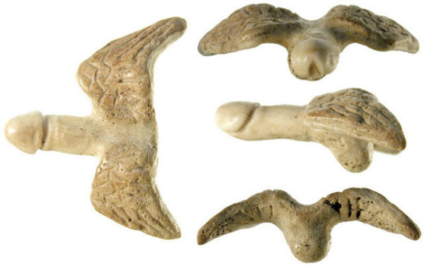 A winged phallus charm made out of animal bone. Photos were made from four different angles.