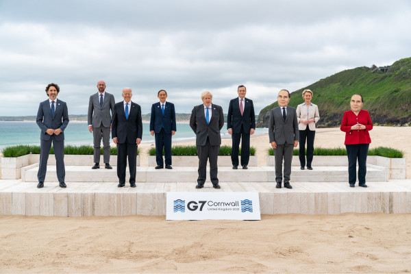 Group photo of delegates attending G7 summit 2021. In front row, left to right, Trudeau, Biden, Boris Johnson, Macron looking like Mitterand, Merkel... also looking like Mitterand.