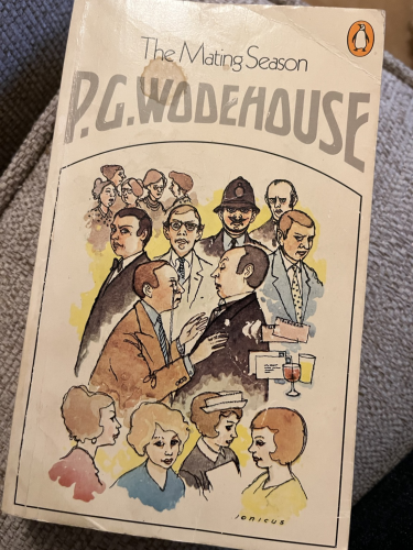 Cover of the penguin edition of The Mating Season featuring images of a number of the featured characters including Jeeves, Bertie Wooster, a policeman and a collection of stern looking aunts.