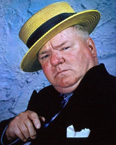 Photo of American actor W.C. Fields, wearing a straw hat.
