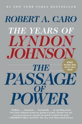 A gray book cover with the title and author of the book in blue and red. The Title is The Passage of Power: The Years of Lyndon Johnson. The author is Robert A Caro