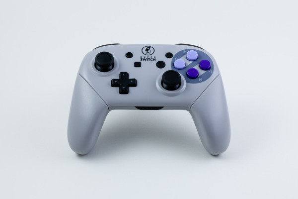 Switch pro controller with a Super Nintendo themed shell