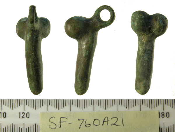 Three photographs of a pendant in the shape of a phallus hat make it look as if it's three phalloi next to one another. The form is simple, with a scrotum and a shaft, the glans and idealised tapered foreskin may have disappeared in wear or they were not so detailled in the first place.