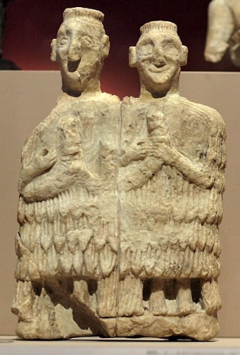 Ancient Sumerian statuette of two gala priests, dating to ca. 2450 BCE, found in the temple of Inanna at Mari.