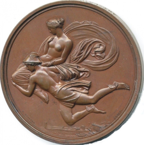 Circular, coin-like bronze medal with a relief of Hermes carrying Pandora in his arms. He is identified by his winged hat and a pair of ankle wings. Below the pair, a temple and a few houses, all tiny, indicate that they are high up in the air.