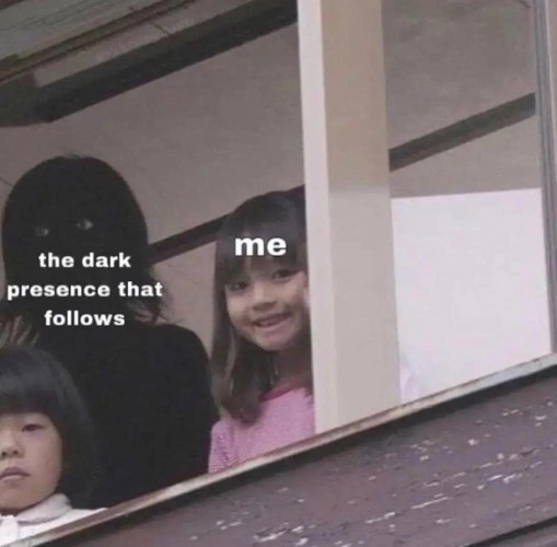 A photo of a black shadowy figure stands in front of a little child and to the side of a little girl, smiling widely.
The text on the black figure says "the dark presence that follows"
And the text on the smiling little girl says "me"