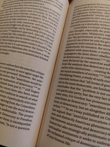 Picture of an open book showing two pages of words on an angle.