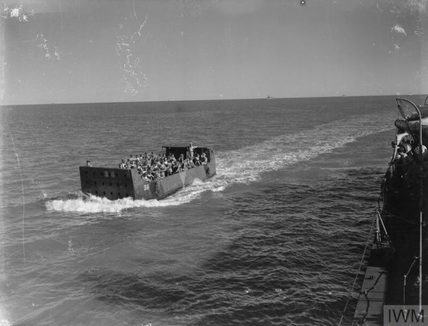Infantry going ashore in a landing craft at Majunga, after the inital landing which took place during darkness.