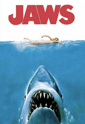 Movie poster for JAWS. A blond, nude woman swims past at the surface level of the ocean unaware of the menacing shark with jaws packed with rows and rows of dagger-like teeth rising from the deep.
