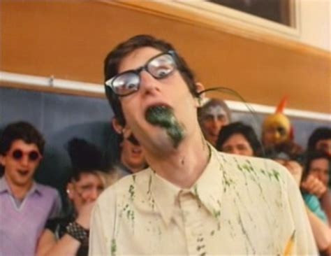 One of the first victims of the toxins in the trauma movie class of nuke 'em high.

He's a dorkish nerdy looking person in a yellow shirt with glasses and red hair and black bile coming out of his mouth while he stares dazedly into the camera