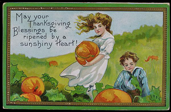 A postcard from the early 20th century of a little boy and girl in a pumpkin patch. The text reads “May your Thanksgiving Blessings be ripened by a sunshiny heart”