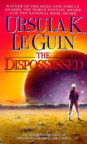 Book cover, feating bright reds and oranges, and a lone figure on a desert ground seeing a large planet in the distance. Ursula K. Le Guin - The Dispossessed