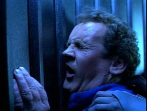 Chief O’Brien being shoved into a wall. Wincing in pain.